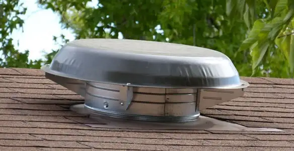 attic fan installation services with low-profile roof ventilation unit in Sarasota, FL