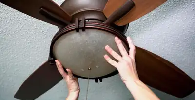 Ceiling fan repair and reinstallation on ceiling mount in Sarasota, FL