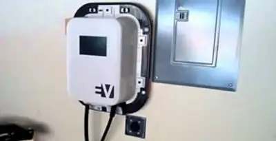 Electric car charger installation with wall-mounted EV charging station in Sarasota, FL