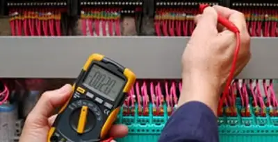 electrical service showing professional testing and troubleshooting of electrical panel by licensed electricians in Sarasota, FL