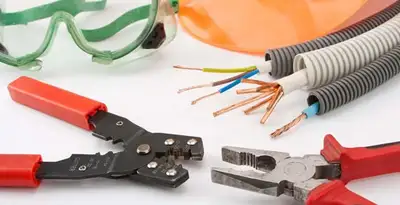 Electrical wiring repair with professional tools and safety equipment in Nokomis, FL