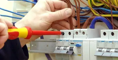 electrician services performing professional electrical panel wiring and connections in Sarasota, FL