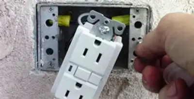 gfci circuits service showing installation of a ground fault circuit interrupter outlet by licensed electricians in Sarasota, FL