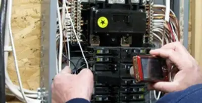 Home electrical inspection of circuit breaker panel by licensed electrician in Sarasota, FL