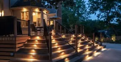 Residential electrician installing outdoor lighting for home safety in Sarasota, FL