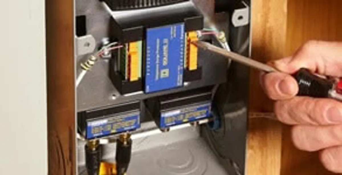 Whole home surge protection device being installed by a licensed electrician to protect electrical systems in Sarasota, FL