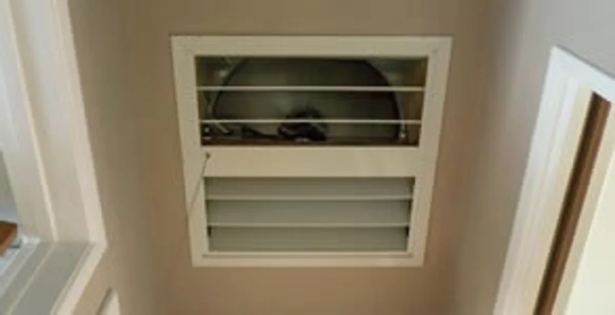 whole house fan installation services with ceiling-mounted ventilation system in Sarasota, FL